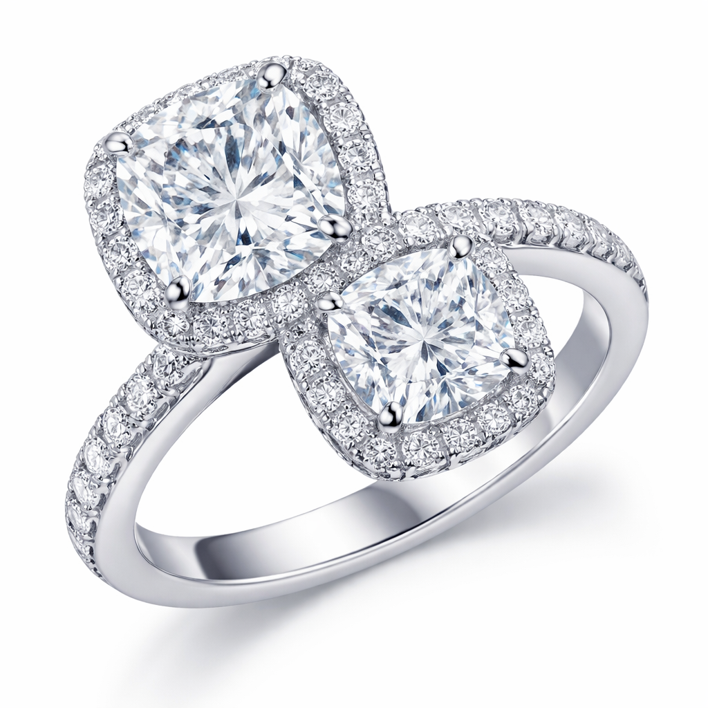 Ring with 2 cushion cut diamonds, on a little smaller than the other