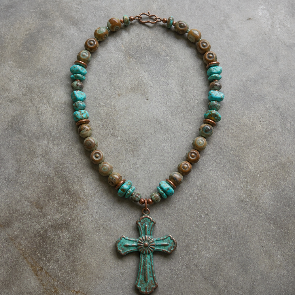 8.5-9mm soapstone in earth tones with carved eye round beads, turquoise chunky chips 9x12mm, Heishi beads 3mm, copper with green patina cross pendant 3x4” necklace
photorealistic jewelry design, 8.5-9mm soapstone in earth tones with carved eye round beads, turquoise chunky chips 9x12mm, Heishi beads 3mm, copper with green patina cross pendant 3x4” necklace , bohemian style, just the design no text