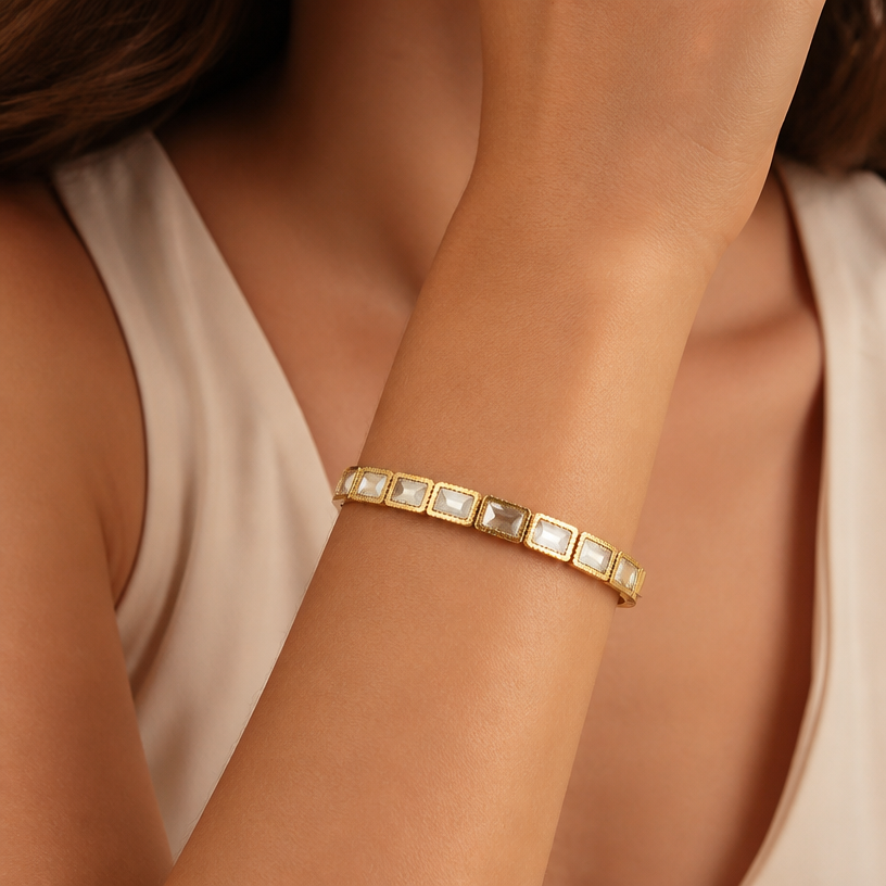 A women's bracelet. coloque o bracelete na modelo
using the attached image as a visual reference, create A women's bracelet. coloque o bracelete na modelo. photorealistic, just the design no text
