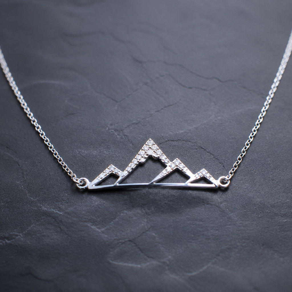A women's necklace made of silver with diamond stones. S'inspirer de montagne, minimaliste et metaux fins
photorealistic jewelry design, A women's necklace made of silver with diamond stones. S'inspirer de montagne, minimaliste et metaux fins, modern style, just the design no text