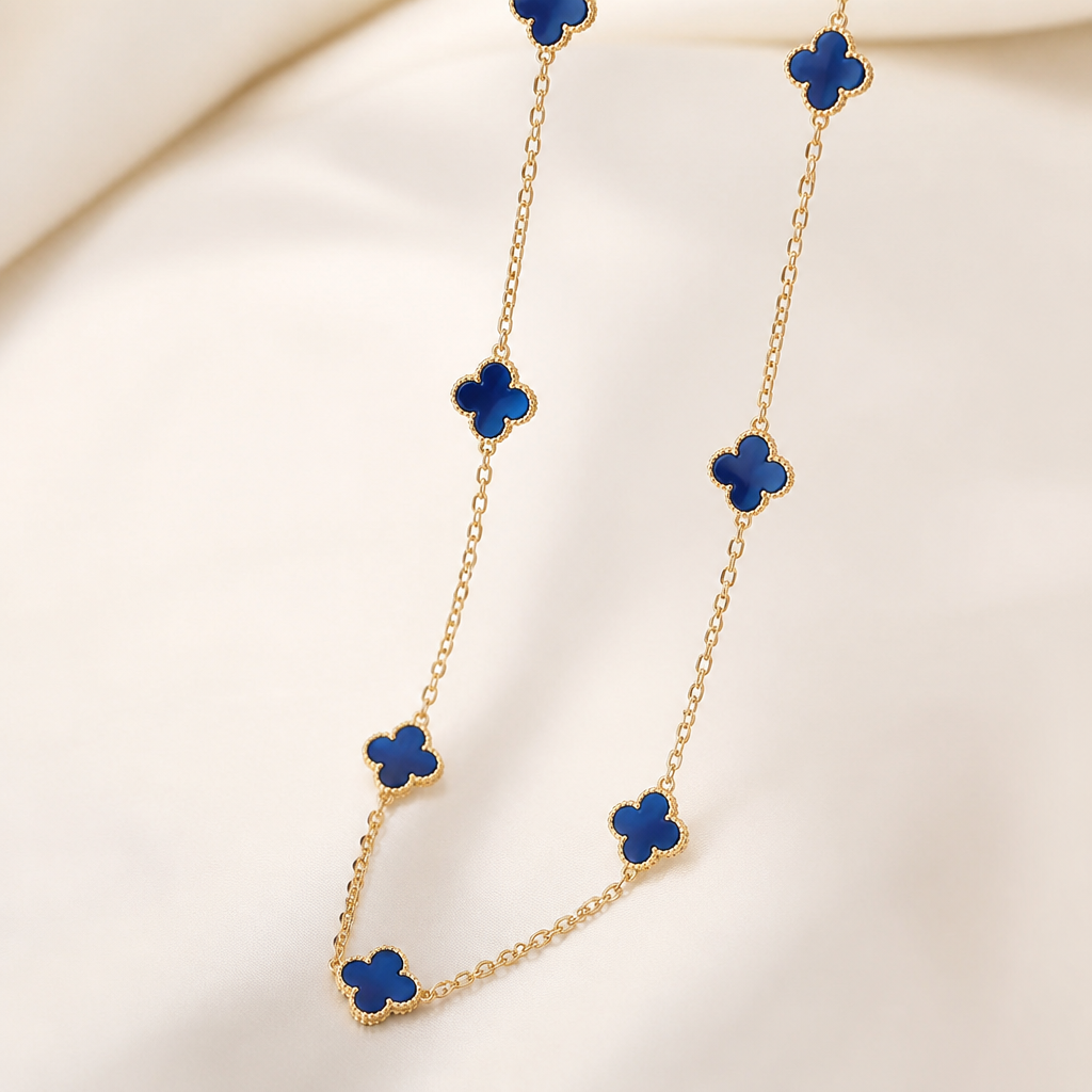 A women's pendant made of gold. chaîne en or collir avec des fleurs bleu marine à 4 feuilles sautoir
photorealistic jewelry design, A women's pendant made of gold. chaîne en or collir avec des fleurs bleu marine à 4 feuilles sautoir, modern style, just the design no text