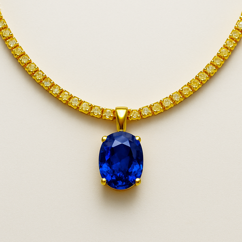 Tennis necklace made of yellow 18k gold with yellow sapphires all around (each 1mm of diameter- round) and as a pendant an oval royal blue sapphire with dimensions of  7.150 x 5.220 x 3.530mm