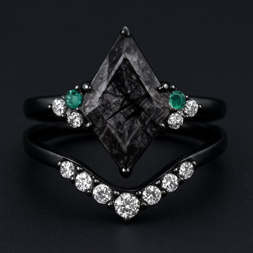 Kite cut Black rutilated quartz with 1 emerald on each side and 3 moissanite on each side accent stones in a cluster on a black band, separate wedding band black with moissanite stones that curves around the main stone 