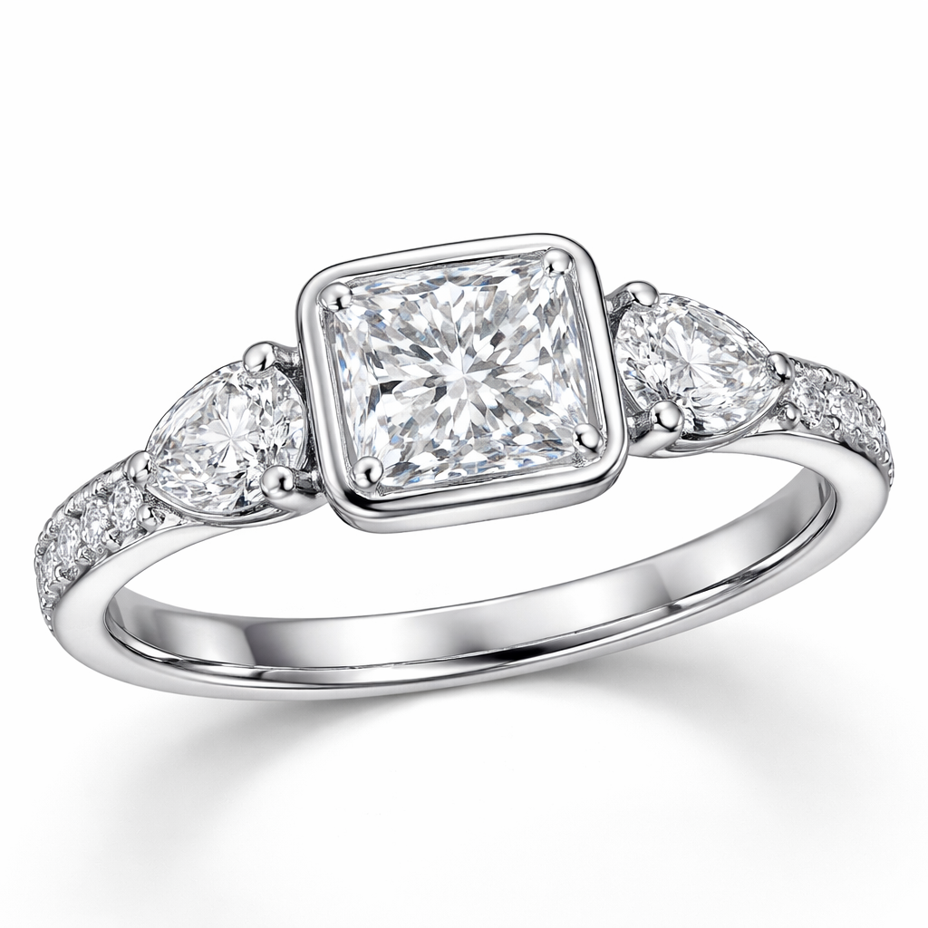 Bezel set radiant cut with pear diamonds on either size and some smaller diamonds in the medium thickness white gold band