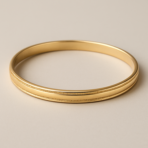 Create a 14k yellow gold bangle with sophisticated detailing