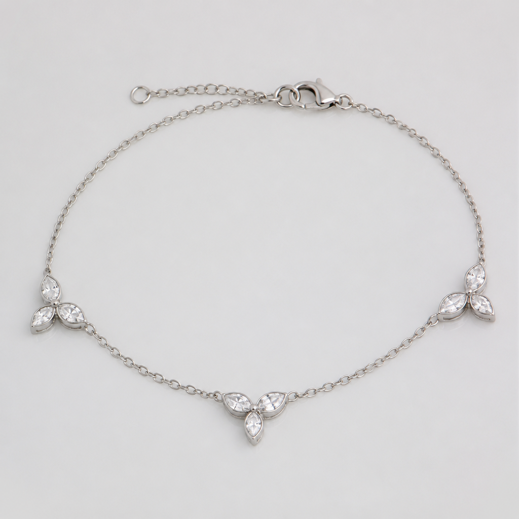 A women's bracelet made of silver with diamond stones. bracelet tres petites feuilles minimaliste et metal tres fin avec chaine, le long du bracelet chaune entre les feuilles
photorealistic jewelry design, A women's bracelet made of silver with diamond stones. bracelet tres petites feuilles minimaliste et metal tres fin avec chaine, le long du bracelet chaune entre les feuilles, modern style, just the design no text