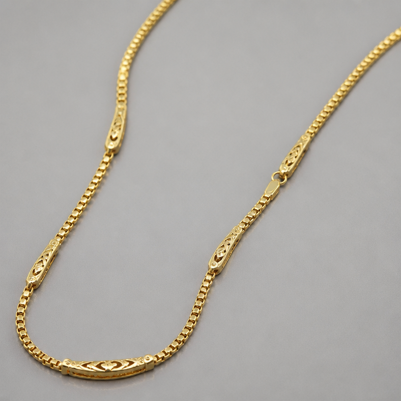 A minimalist women's necklace made of gold, detailed and decorative, moderately ornate. cadena de oro de 14 kilates 15 gramos y de 45 cm
using the attached image as a visual reference, create A minimalist women's necklace made of gold, detailed and decorative, moderately ornate. cadena de oro de 14 kilates 15 gramos y de 45 cm. photorealistic, just the design no text