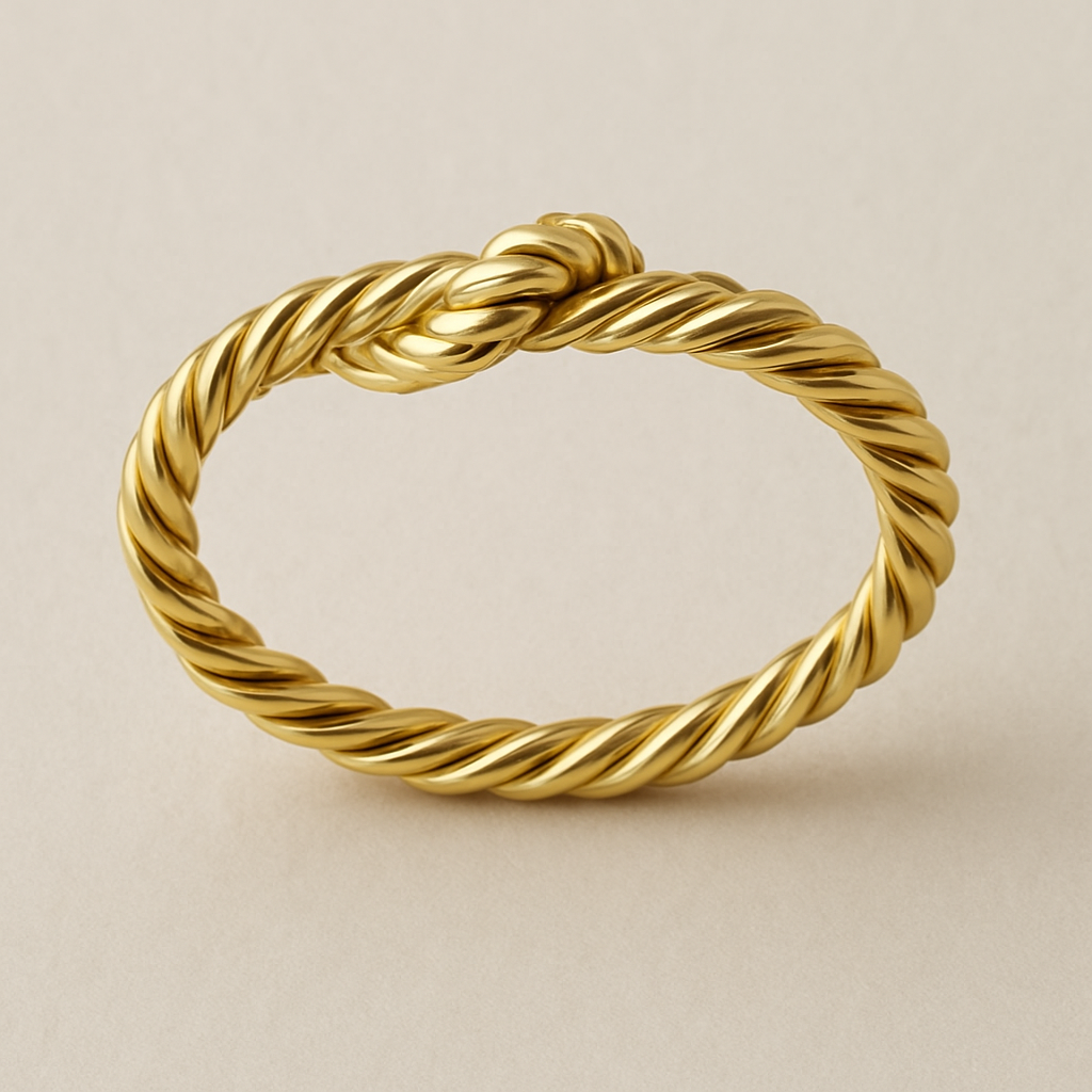 Yellow gold ring made to look like a piece of twine wrapped like a ring 