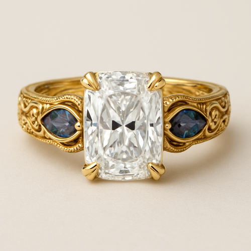 2 carat elongated cushion cut diamond engagement ring with double claw prongs in yellow gold ring with marquise shaped alexandrite side stones 