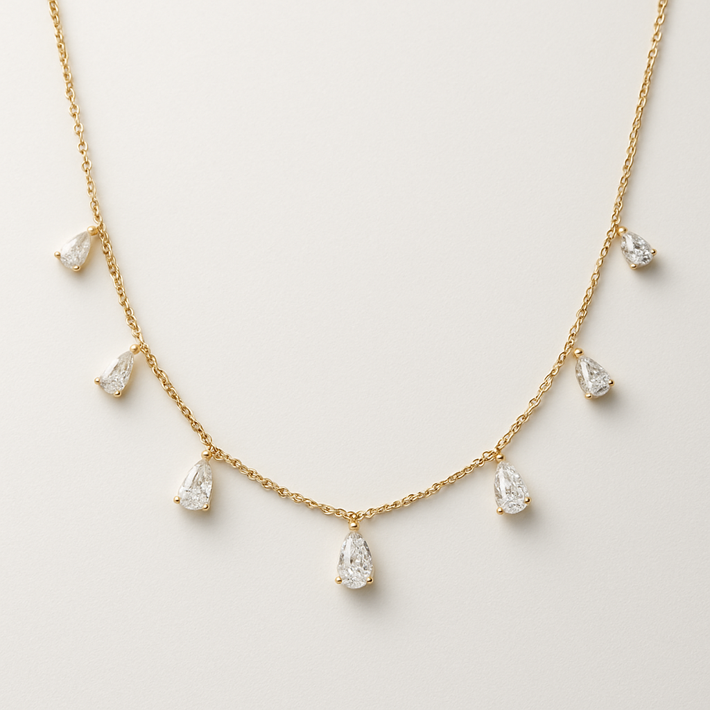 Pear shape pears station necklace 7 diamonds small each diamonds .15 no bezel