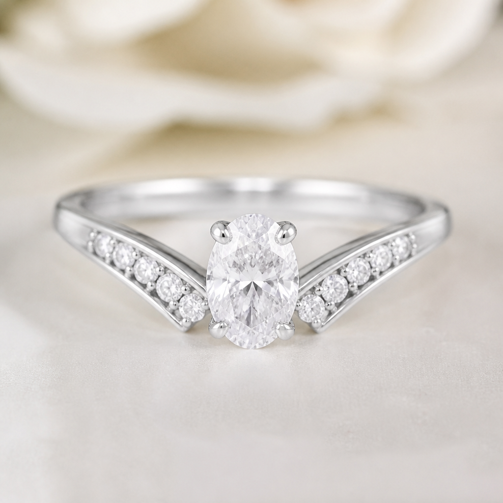 A contemporary women's ring made of white gold with diamond stones suitable for wedding. A 0.70-carat oval diamond is used as the center stone.
photorealistic jewelry design, A contemporary women's ring made of white gold with diamond stones suitable for wedding. A 0.70-carat oval diamond is used as the center stone., contemporary style, just the design no text