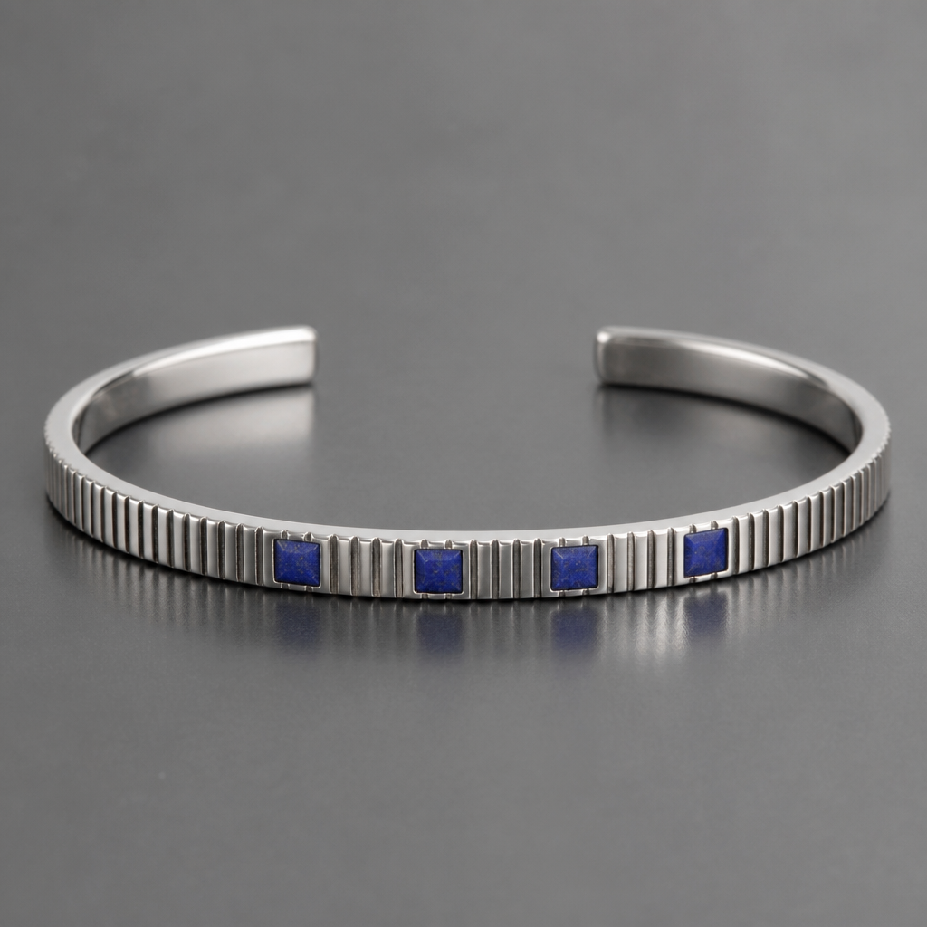 A men's bracelet made of silver. 2mm*4mm cuff with vertical groves and 4 lapis stones in the middle the stones are flush in the silver so it must be smaller than the cuff
photorealistic jewelry design, A men's bracelet made of silver. 2mm*4mm cuff with vertical groves and 4 lapis stones in the middle the stones are flush in the silver so it must be smaller than the cuff, modern style, just the design no text