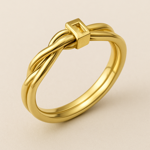 Yellow gold ring made to look like a bread twist tie