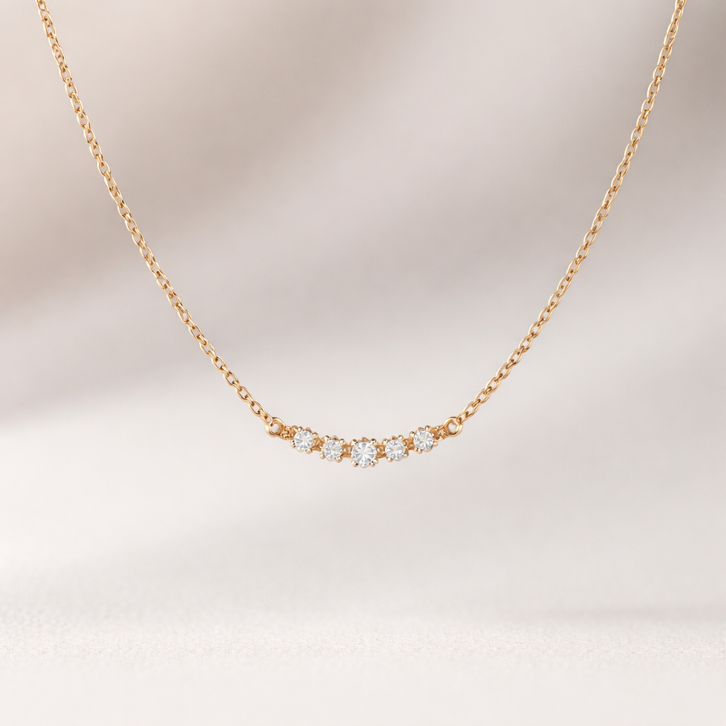 A minimalist women's necklace made of gold with diamond stones suitable for daily wear
A minimalist women's necklace made of gold with diamond stones suitable for daily wear, minimalist style