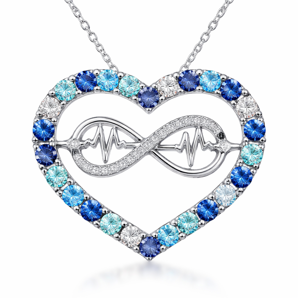 A heart necklace with the infinity symbol and heartbeat wave with alternating March, September and December birthstones all the way around the heart and infinity symbol