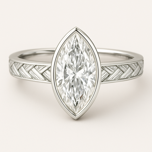 Bezel set 6 carat marquise diamond center stone with baguette diamonds in a herringbone pattern in the band