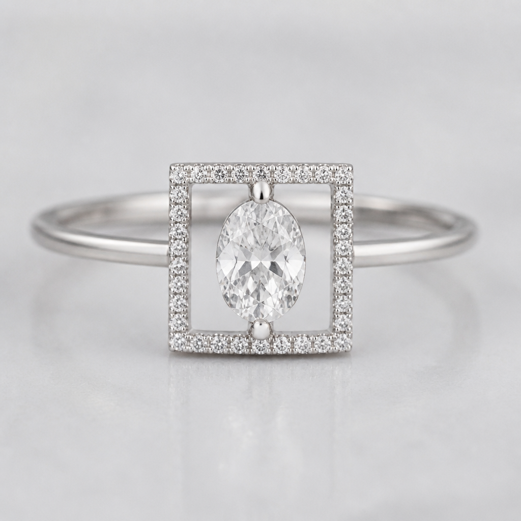 A women's ring made of silver with diamond stones. bague sertie d'un diamant oval, à l'intérieur du carré droit ligne remplie de petit diamant feminin, delicat, minimaliste metal tres fin, avec un vide entre loval et le carré, l'oval attache verticalement au carré, carré petit
photorealistic jewelry design, A women's ring made of silver with diamond stones. bague sertie d'un diamant oval, à l'intérieur du carré droit ligne remplie de petit diamant feminin, delicat, minimaliste metal tres fin, avec un vide entre loval et le carré, l'oval attache verticalement au carré, carré petit, modern style, just the design no text