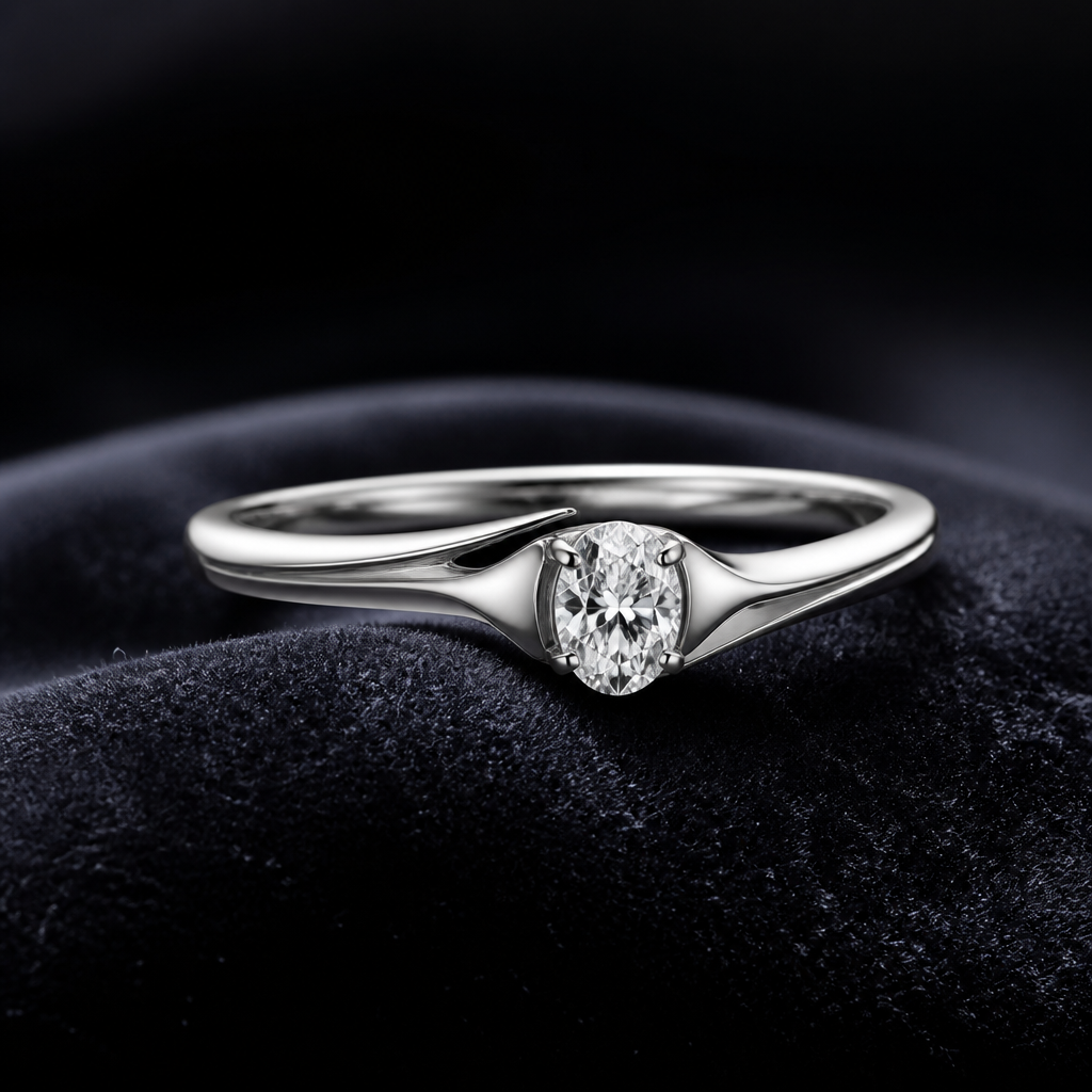 A women's ring. A luxurious minimalist ring design crafted from polished white gold with a smooth, elegant, and refined silhouette. The ring features a delicate modern structure with perfectly balanced proportions, expressing quiet luxury and timeless sophistication. At the center sits a small brilliant-cut diamond or oval gemstone, subtly elevated in a clean minimal setting without excessive details. The surface is highly reflective with soft realistic highlights and premium jewelry finishing. The design combines simplicity, elegance, and modern luxury aesthetics. Displayed on a dark velvet background with soft cinematic lighting, shallow depth of field, ultra-realistic textures, fine jewelry photography style, premium fashion aesthetic, highly detailed, 8K resolution, realistic reflections, elegant shadows, luxury branding mood.
photorealistic jewelry design, A women's ring. A luxurious minimalist ring design crafted from polished white gold with a smooth, elegant, and refined silhouette. The ring features a delicate modern structure with perfectly balanced proportions, expressing quiet luxury and timeless sophistication. At the center sits a small brilliant-cut diamond or oval gemstone, subtly elevated in a clean minimal setting without excessive details. The surface is highly reflective with soft realistic highlights and premium jewelry finishing. The design combines simplicity, elegance, and modern luxury aesthetics. Displayed on a dark velvet background with soft cinematic lighting, shallow depth of field, ultra-realistic textures, fine jewelry photography style, premium fashion aesthetic, highly detailed, 8K resolution, realistic reflections, elegant shadows, luxury branding mood., modern style, just the design no text