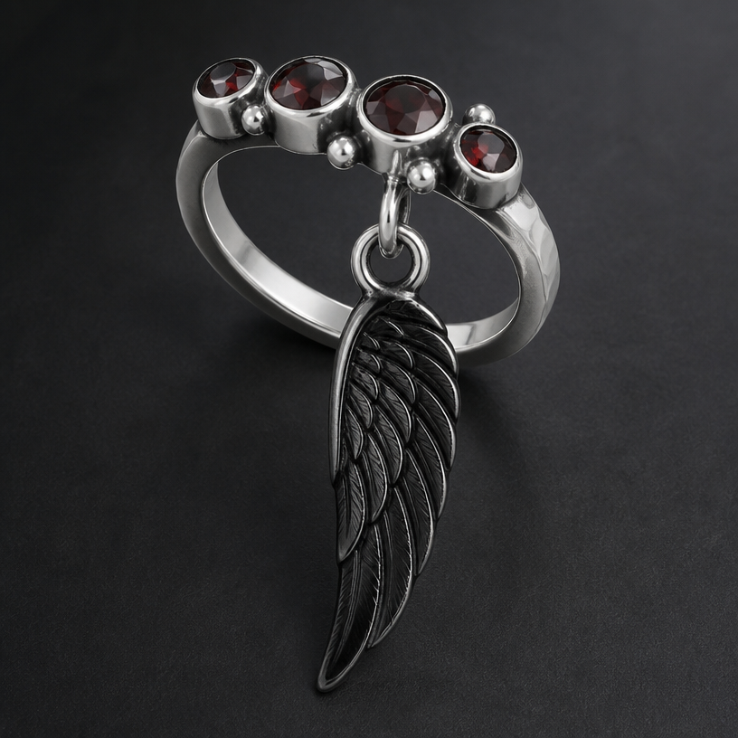 A contemporary women's ring made of silver with garnet stones suitable for daily wear. angel feather gemstone pendant in black
using the attached image as a visual reference, create A contemporary women's ring made of silver with garnet stones suitable for daily wear. angel feather gemstone pendant in black. photorealistic, just the design no text