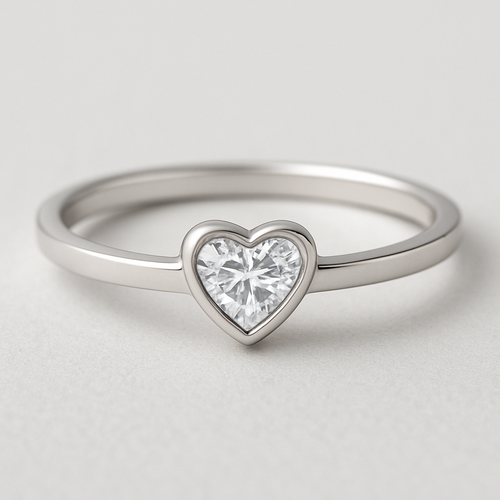 create a jewellery design in silver with a single heart shaped diamond. The design should be minimal 