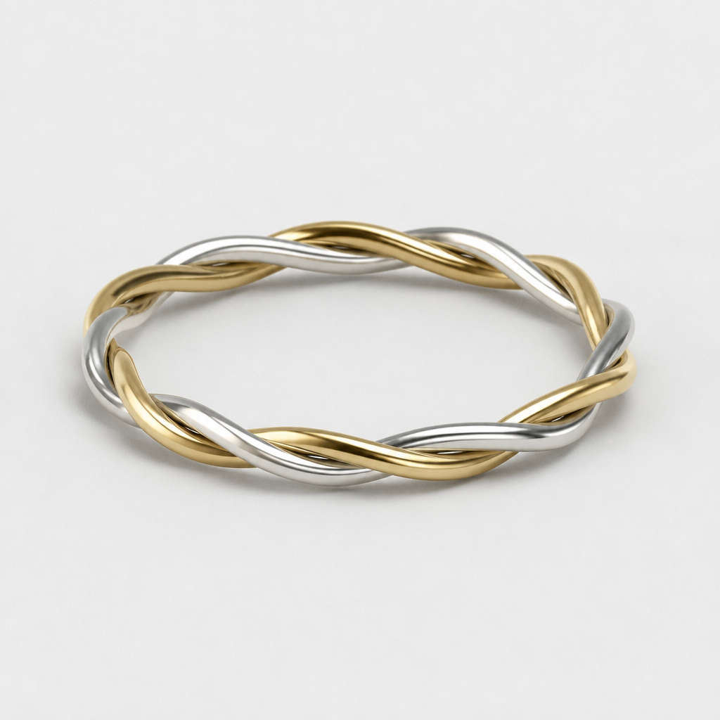 Progetta un anello con un gambo intrecciato, utilizzando un filo d’oro giallo e un filo di argento normale. La circonferenza del dito deve essere tra 9 e 10 mm.
photorealistic jewelry design, Progetta un anello con un gambo intrecciato, utilizzando un filo d’oro giallo e un filo di argento normale. La circonferenza del dito deve essere tra 9 e 10 mm., just the design no text