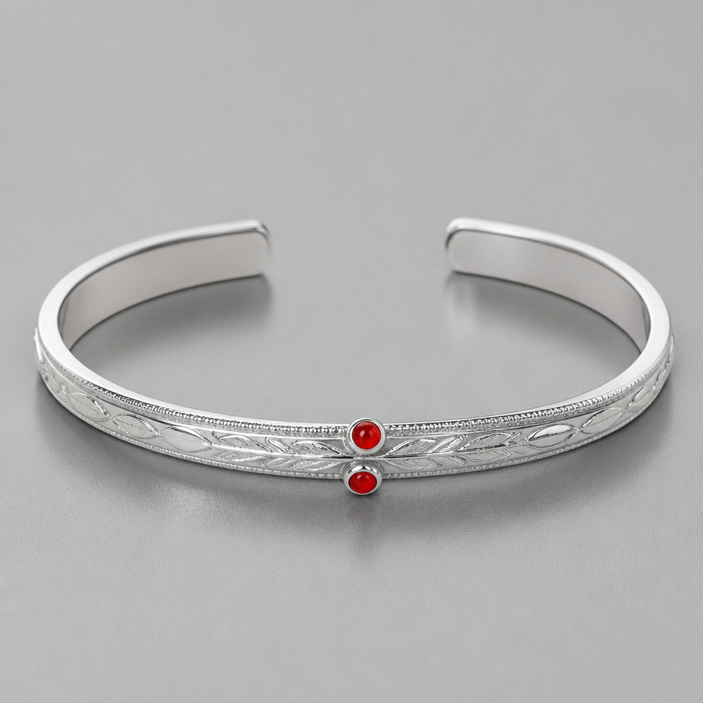 A women's bracelet made of silver. 2mm*4mm cuff with 2mm circle red coral stones carved inside the cuff one up and one down
photorealistic jewelry design, A women's bracelet made of silver. 2mm*4mm cuff with 2mm circle red coral stones carved inside the cuff one up and one down, modern style, just the design no text